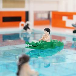 Legomodell illustrerar vattenlek i Järfällas nya simhall
